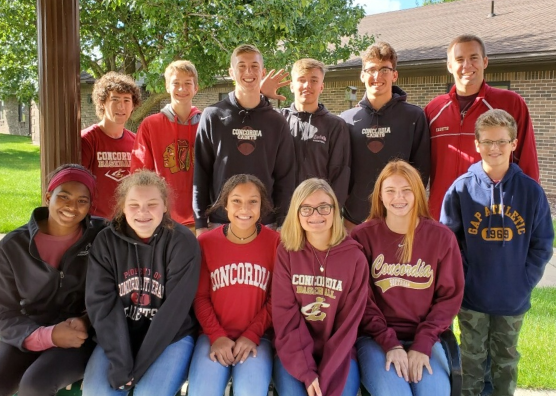 Group of Concordia students smiling for a photo